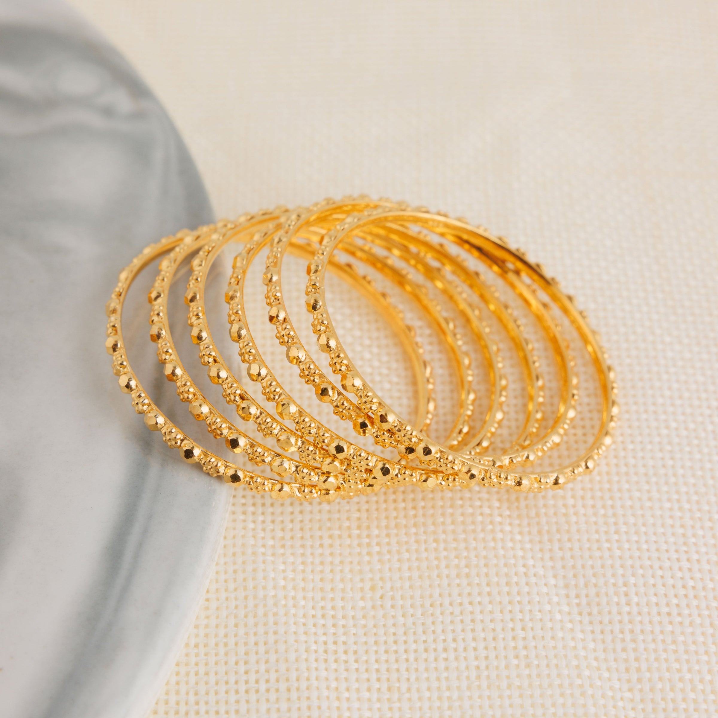 Aqsa gold-plated bangles